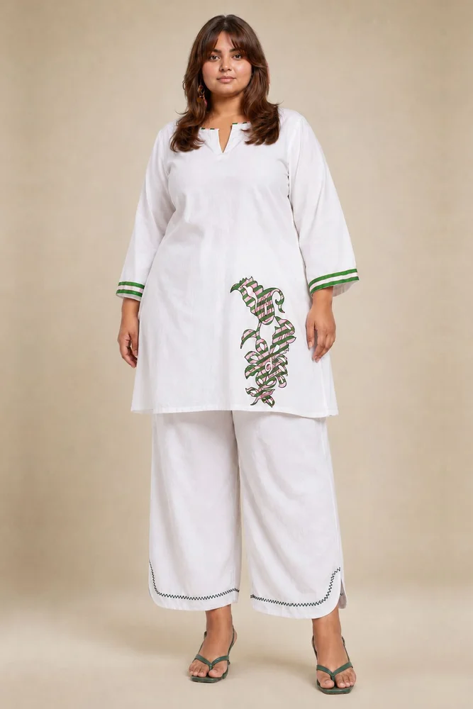 White Short Kurta With Embroidery Paired With Matching Pants With Curved Hemline