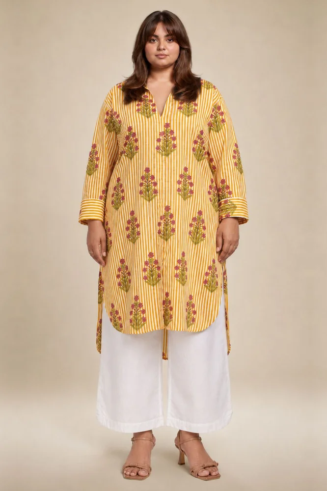 Yellow Floral Shirt Style Kurta Paired With Curved Hem White Pants